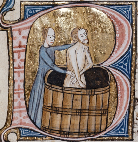 illumination of woman bathing man in tub in a capital letter B